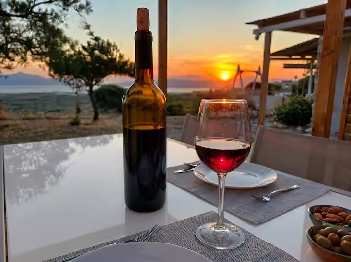 Sunset dinner overlooking the Aegean Sea at Perliti