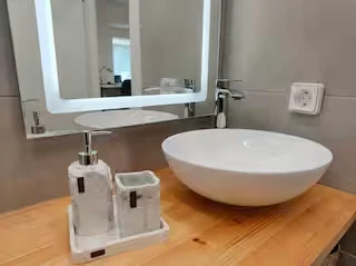 Modern bathroom vanity at Perliti Cycladic House