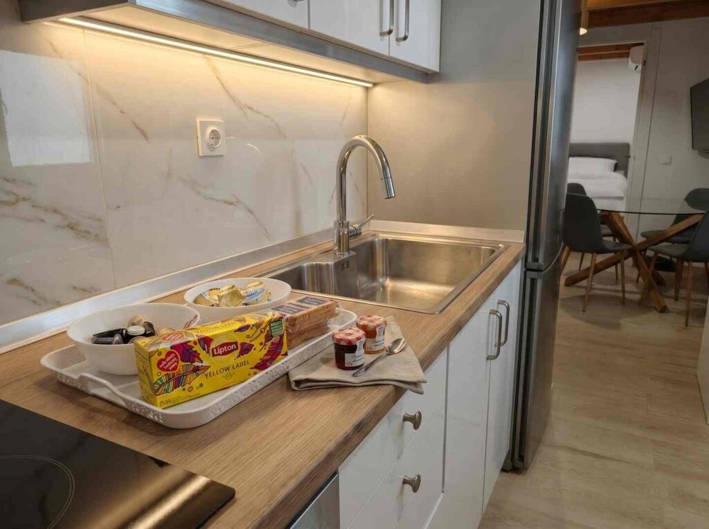 Fully equipped kitchen prepared with breakfast provisions